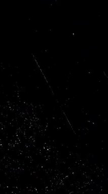 Toz Parçacıkları ve Çizilmiş Film ile dikey Retro Doku Örtüsü. Yüksek kalite 4k görüntü