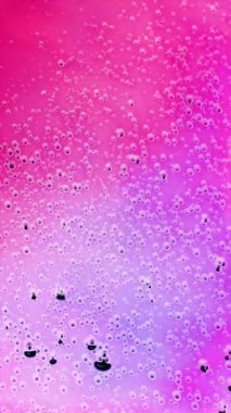 Canlı sıvı kabarcıklar soyut bir arkaplan oluşturuyor. Yüksek kalite 4k görüntü