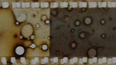 Vintage Film Dust and Scratch Texture for Cinematic Overlays. High quality 4k footage