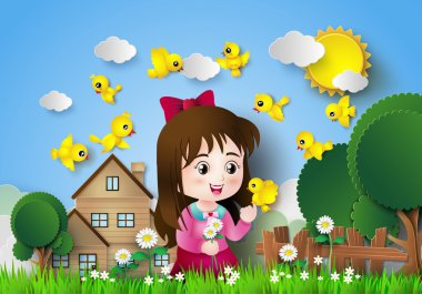 Sevimli kız bir çiçek bahçesinde oturan.