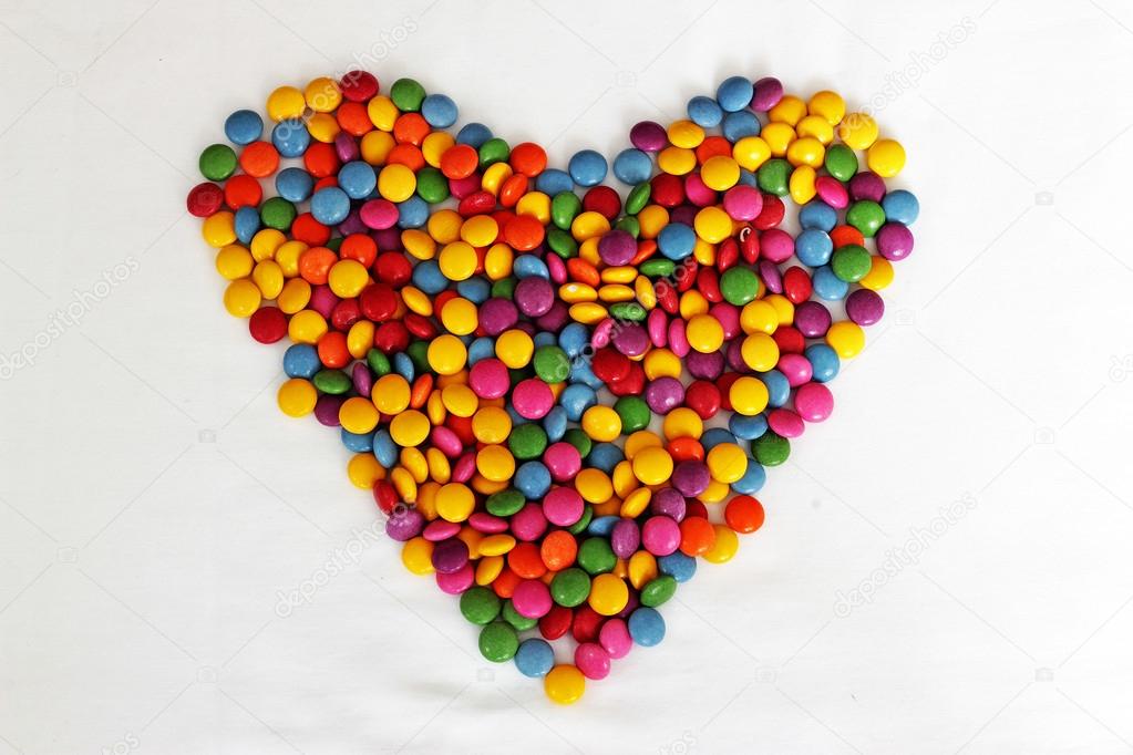 Sweet bonbons candy in heart shaped