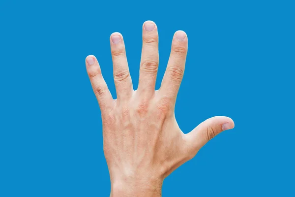 Hand Nahsicht Über Blauem Hintergrund — Stockfoto