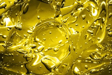 Arkaplanda sarı ve turuncu su damlaları