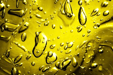 Arkaplanda sarı ve turuncu su damlaları