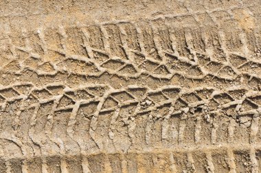 Kumda tekerlek izi, desenli arkaplan