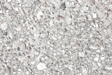 Çatlakları ve çizikleri olan beton bir duvarın dokusu arka plan olarak kullanılabilir.