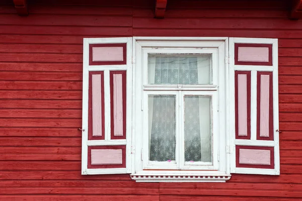 window with windows and wooden shutters