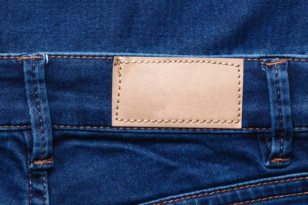 Jeans Mit Blauer Denim Textur Und Leerem Etikett — Stockfoto