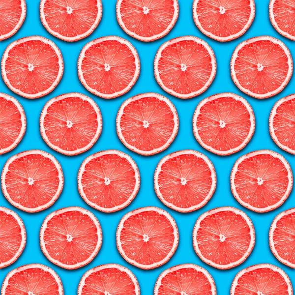 background of fresh red grapefruit. top view.