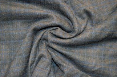 Arkaplan olarak siyah kareli tekstil. Kumaştaki siyah kareli kumaş dokusuna yaklaş. Buruşmuş kumaş dokusu