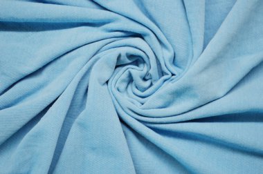 Arka plan olarak mavi tekstil deseni. Kumaştaki mavi kumaş dokusuna yaklaş. Buruşmuş kumaş dokusu