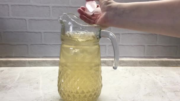 Woman Throwing Ice Jug Homemade Lemonade Kitchen — Stockvideo
