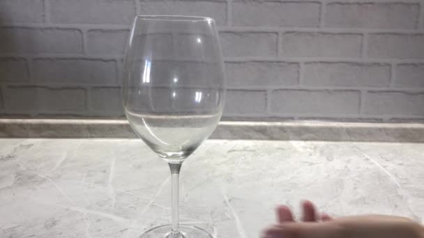 Woman Throwing Ice Empty Glass Goblet Kitchen — 图库视频影像