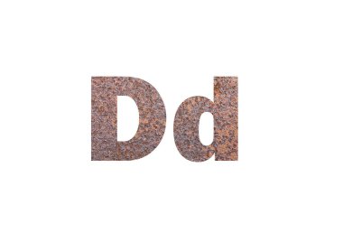 Kahverengi paslı metal doku. D harfinin siluetini delip geçmiş.