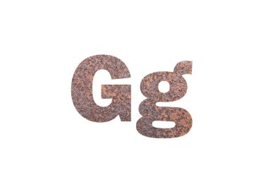 Kahverengi paslı metal doku. G harfinin siluetini delip geçmiş.