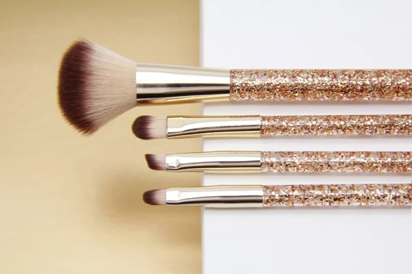 Golden Makeup Brush Set Professional Makeup Artist Tools Applying Powder — Stock Photo, Image