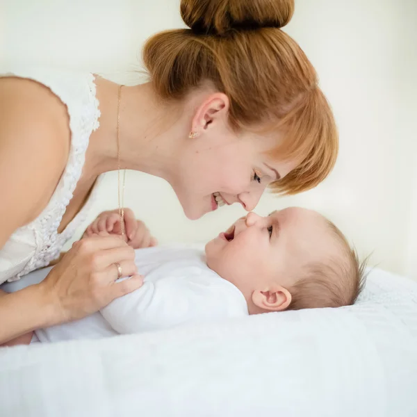 Portrait of happy mother and baby — Stock Photo, Image
