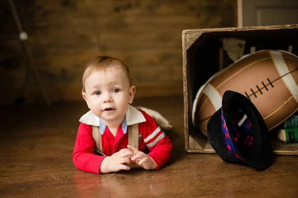 Portrait of cute happy 8 month old baby boy with funny hat. Phot — Stock Photo, Image