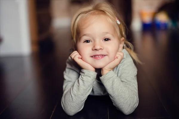 Little girl smiles at the camera. — Stock Photo, Image