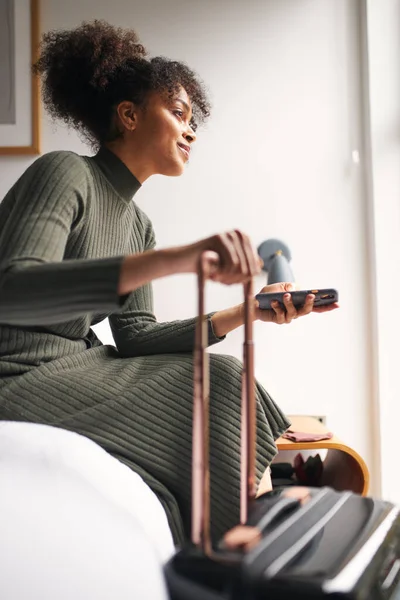 Woman Suitcase Checking Out Boutique Hotel Sitting Bed Waiting Taxi — Stock Photo, Image