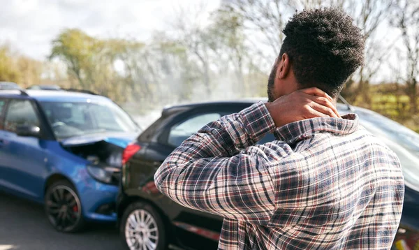 Young Man Rubbing Neck Pain Whiplash Injury Standing Damaged Car — Stock Photo, Image