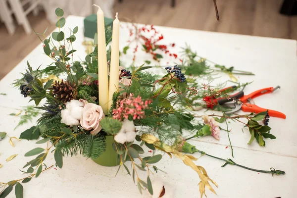 Creating a wonderful composition cotton, cones, fir, magical variety carnations and delicious varieties of roses. Handmade — Stock Photo, Image