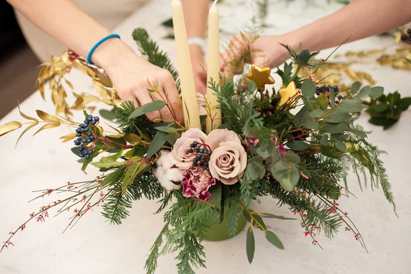 Creating a wonderful composition cotton, cones, fir, magical variety carnations and delicious varieties of roses. Handmade — Stock Photo, Image