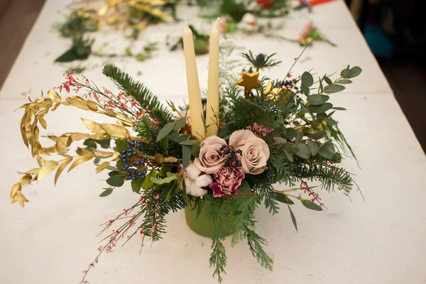 Creating a wonderful composition cotton, cones, fir, magical variety carnations and delicious varieties of roses. Handmade — Stock Photo, Image