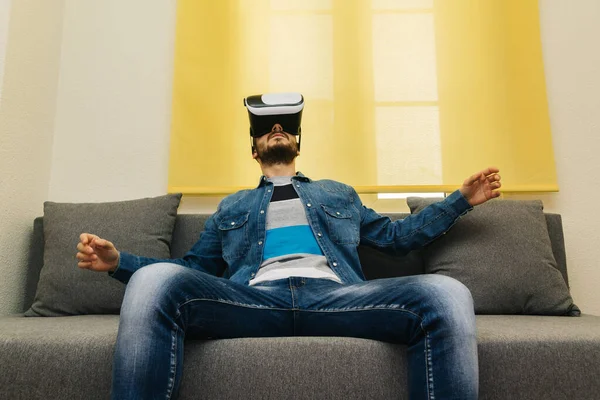 Young man with virtual reality headset. VR, future, gadgets, technology and future concept.