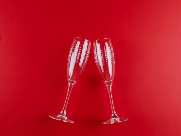 Two Champagne Glasses Lie Middle Red Background Close Top View — Stock Fotó