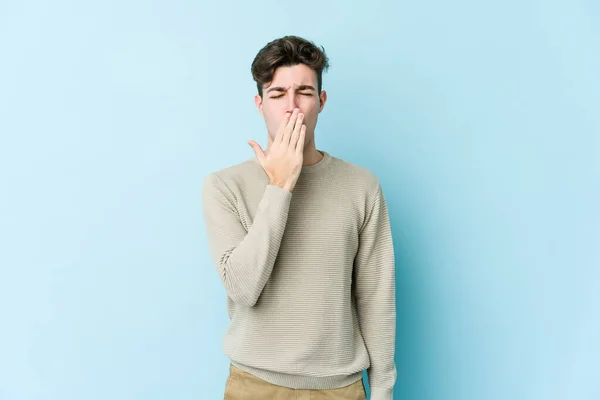 Young Caucasian Man Isolated Blue Background Yawning Showing Tired Gesture — Stock Photo, Image
