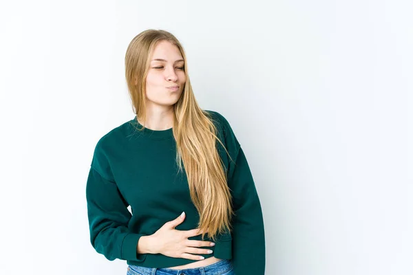 Young Blonde Woman Isolated White Background Touches Tummy Smiles Gently — Stock Photo, Image