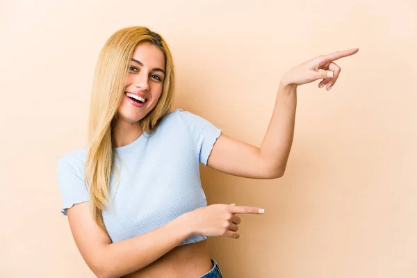 Young Blonde Caucasian Woman Excited Pointing Forefingers Away — Stock Photo, Image