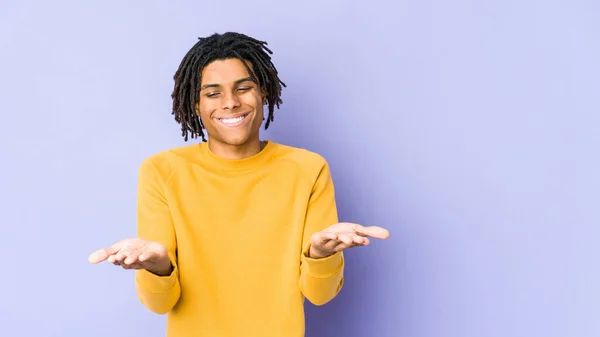 Young Black Man Wearing Rasta Hairstyle Holding Something Palms Offering — Stock Photo, Image