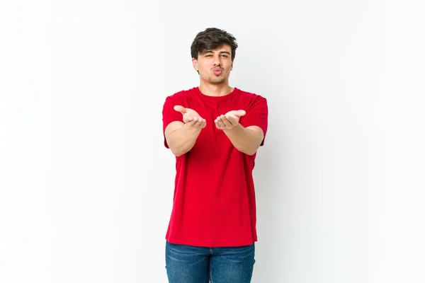 Young Cool Man Folding Lips Holding Palms Send Air Kiss — Stock Photo, Image