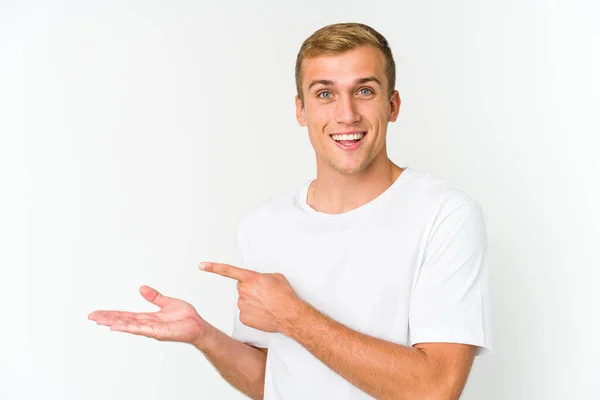 Young Caucasian Handsome Man Excited Holding Copy Space Palm — Stock Photo, Image