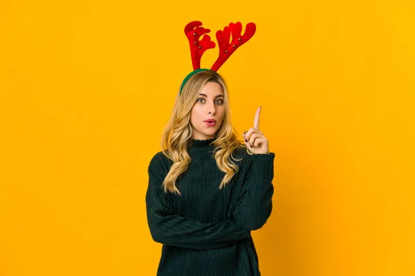 Young Blonde Caucasian Woman Wearing Reindeer Horns Having Some Great — Stock Photo, Image