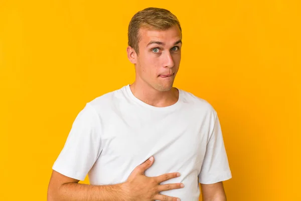 Young Caucasian Handsome Man Touches Tummy Smiles Gently Eating Satisfaction — Stock Photo, Image