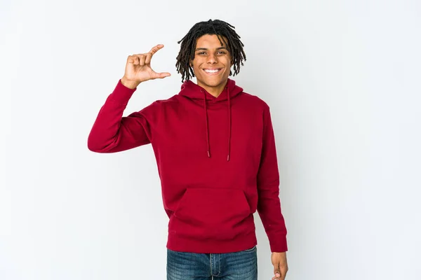 Young African American Rasta Man Holding Something Little Forefingers Smiling — Stock Photo, Image