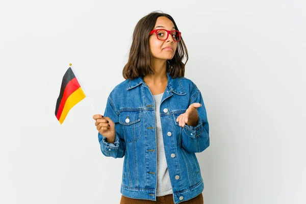 Young Latin Woman Holding German Flag Isolated White Background Stretching — Stock Photo, Image