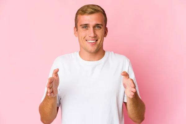 Young Caucasian Handsome Man Holding Something Both Hands Product Presentation — Stock Photo, Image