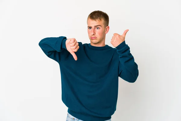 Young Caucasian Handsome Man Showing Thumbs Thumbs Difficult Choose Concept — Stock Photo, Image