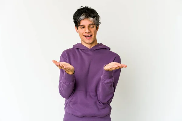 Young Skinny Hispanic Man Holding Something Palms Offering Camera — ストック写真