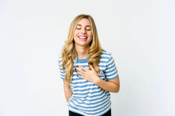 Young Caucasian Blonde Woman Laughs Out Loudly Keeping Hand Chest — Stock Photo, Image