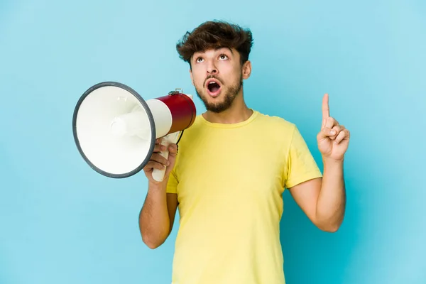 Young Arab Man Holding Megaphone Pointing Upside Opened Mouth — Foto Stock
