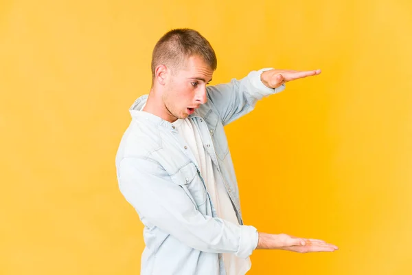 Young Caucasian Handsome Man Shocked Amazed Holding Copy Space Hands — Stock Photo, Image