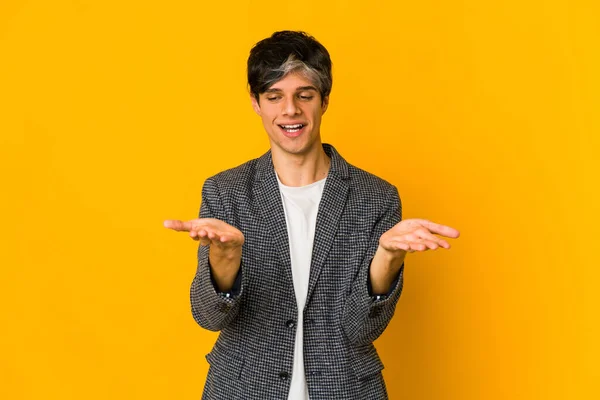 Young Skinny Hispanic Man Holding Something Palms Offering Camera — ストック写真