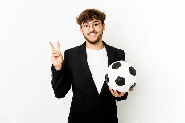 Young Indian Soccer Coach Isolated Joyful Carefree Showing Peace Symbol — Foto Stock