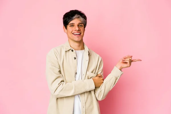 Young Skinny Hispanic Man Smiling Cheerfully Pointing Forefinger Away — ストック写真