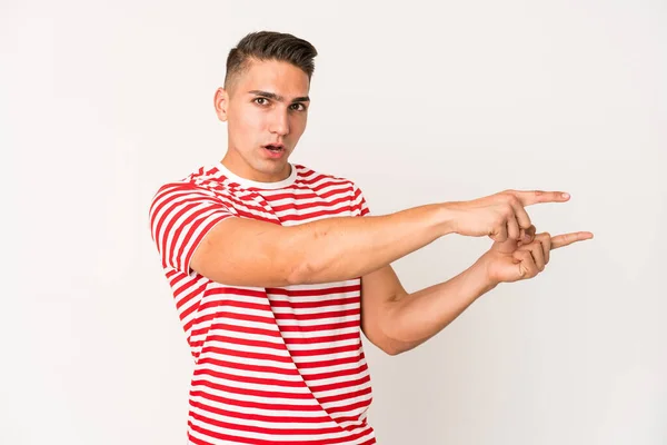 Young Caucasian Handsome Man Isolated Pointing Forefingers Copy Space Expressing — Stock Photo, Image